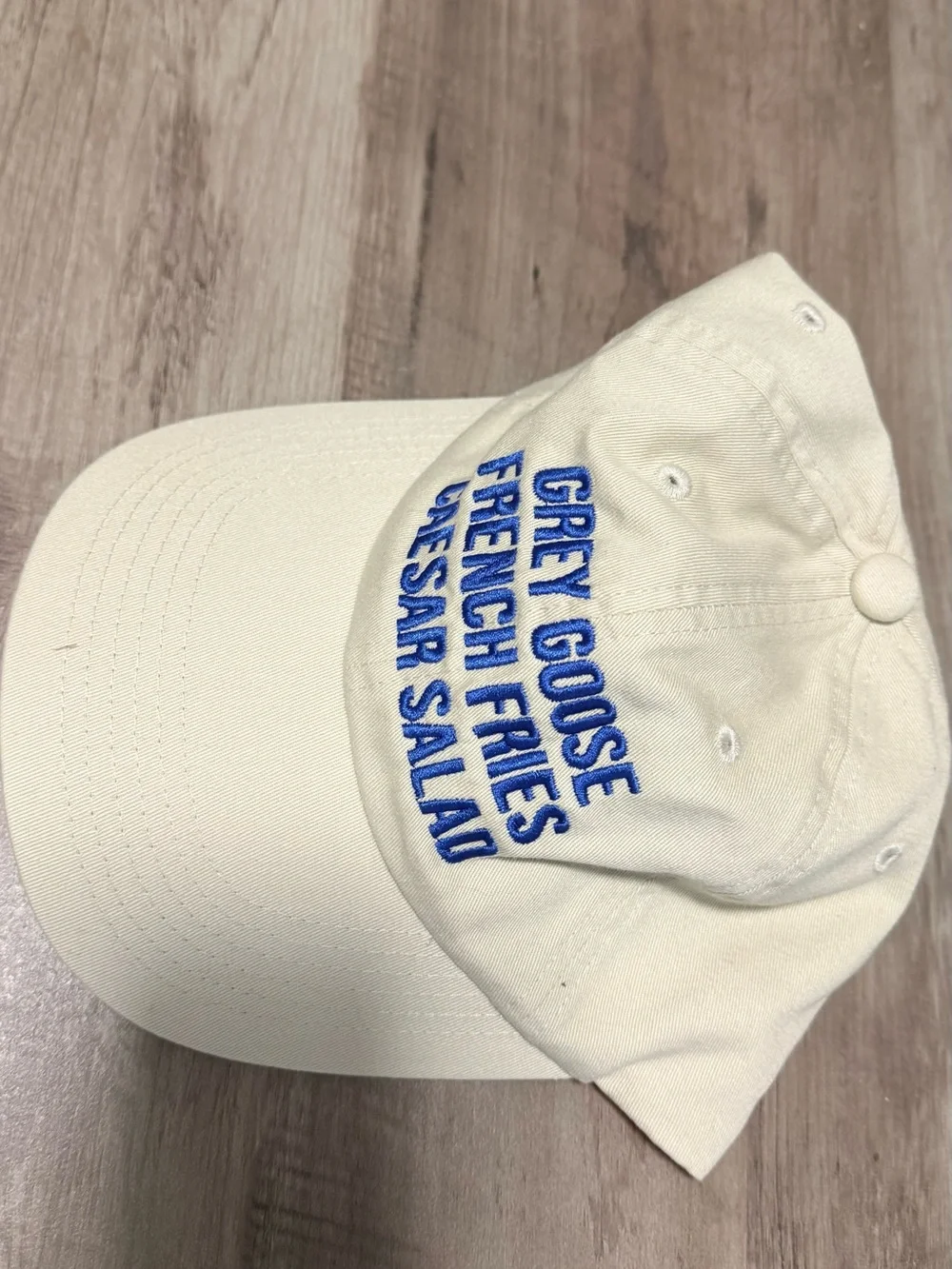 Grey Goose Cream Baseball Cap with Blue Embroidered Text